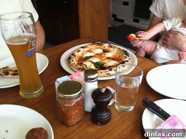 Classic margherita pizza at 2Amys, featuring fresh basil, mozzarella, and tomato sauce.