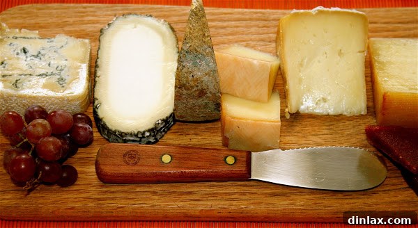 Tinto Gourmet Cheese Board 3 The intimate and inviting interior of the bar at Tinto restaurant, showcasing its elegant design and ambiance.