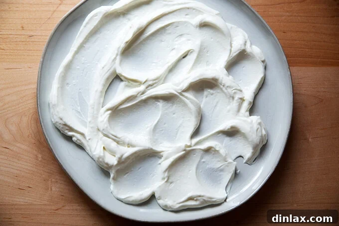 A plate smeared with lemony yogurt sauce.