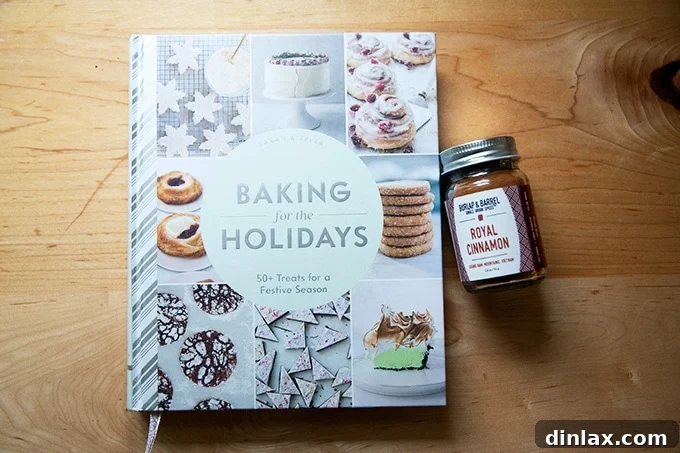 The 2021 Holiday Gift Edit 7 The 'Baking For the Holidays' cookbook by Sarah Kieffer, open to a recipe on a inviting countertop.