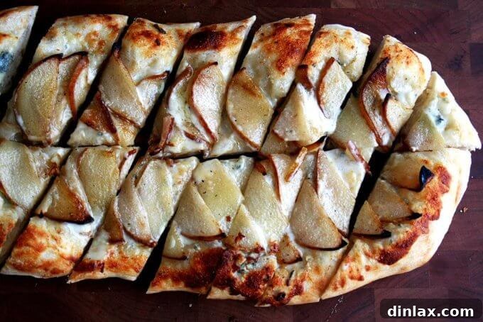 New Year's Eve Party Bites and Sips 5 Alsatian flatbread with pears and gorgonzola, a festive and unique appetizer.