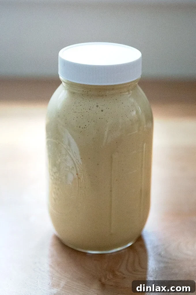 A large jar of tahini dressing.