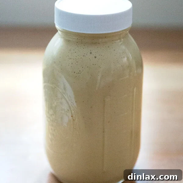 A large jar of tahini dressing.