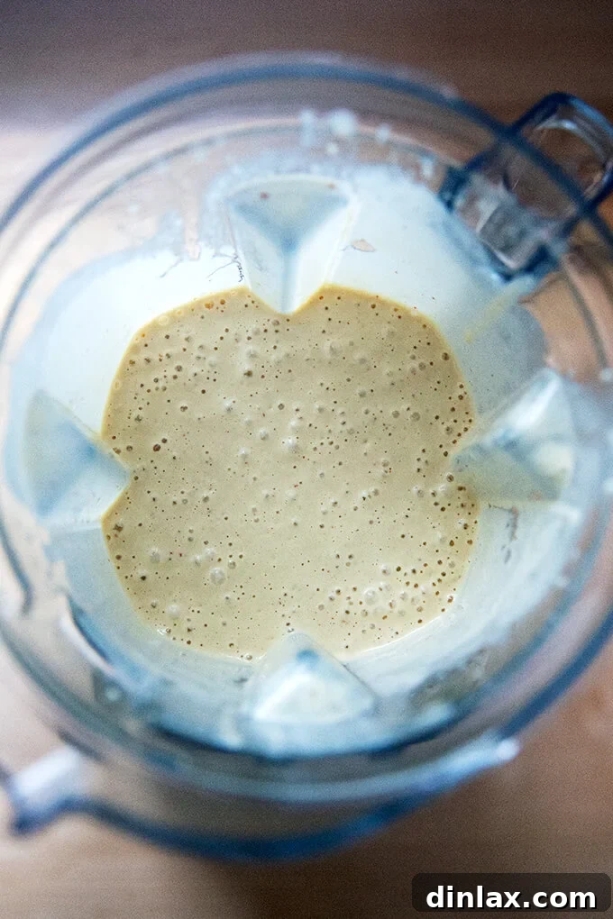 Tahini dressing blended in a blender.