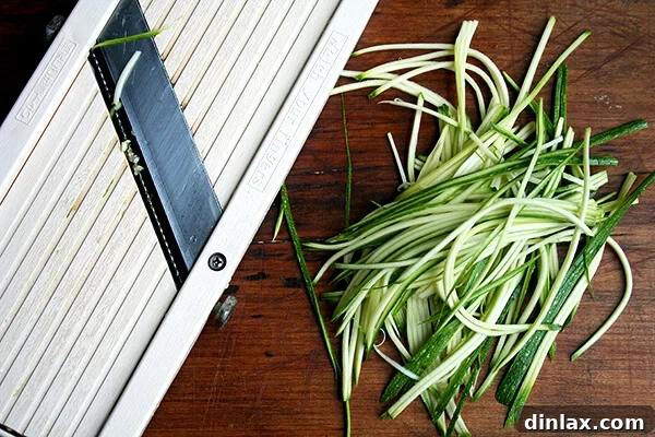 A Benriner mandoline with a handguard