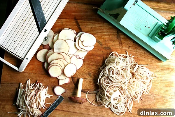 Potatoes being prepared with both mandoline and turning slicer