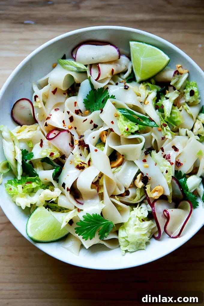 Udon: A Culinary Revelation 17 A vibrant and fresh bowl of Pad Thai Salad from 'To Asia, With Love,' showcasing a colorful array of ingredients.