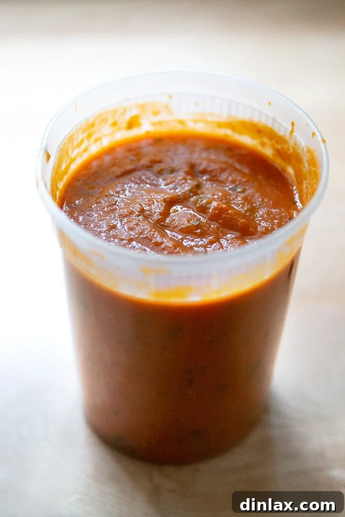 Pantry-Perfect Tomato Sauce in Minutes 12 Homemade tomato sauce in a quart container.