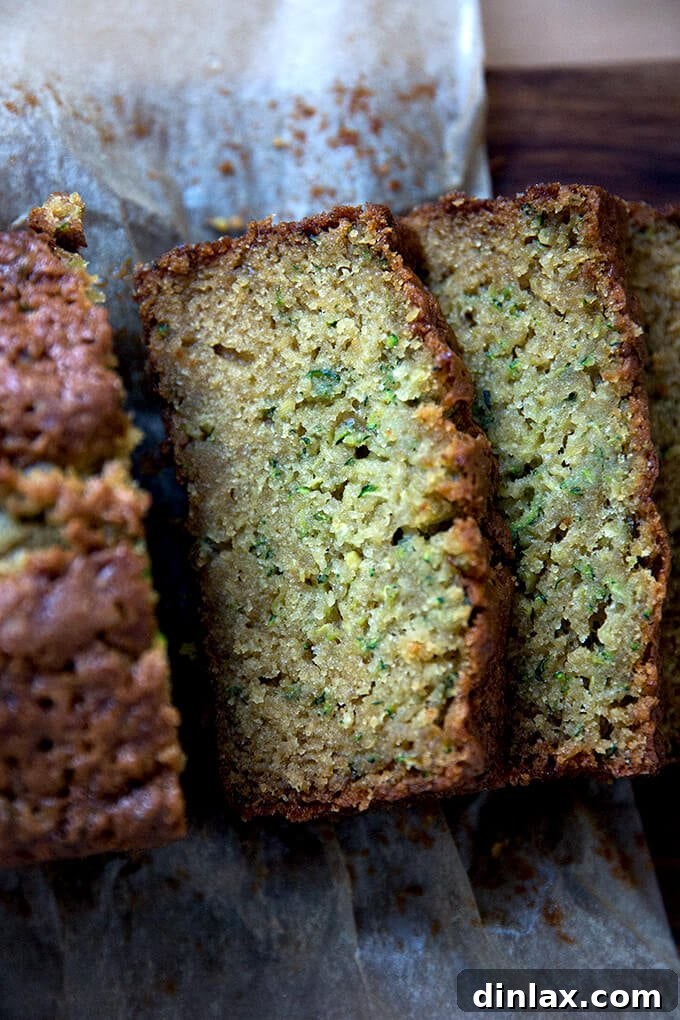 Decadently Moist Zucchini Bread Bliss 11 A beautiful slice of moist zucchini bread revealing its soft, tender crumb and hints of grated zucchini.