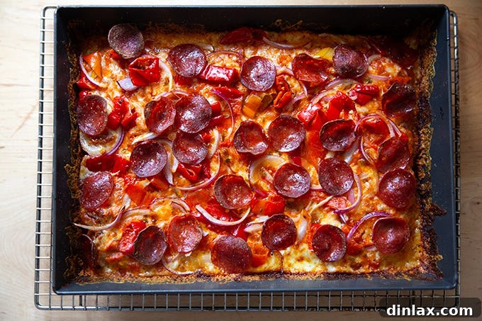 A just-baked Detroit-style pizza in pan.