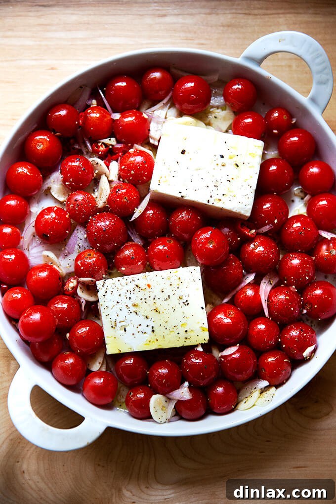 Warm Feta & Burst Tomato Bake 7 A baking dish with tomatoes and feta, ready for the oven.