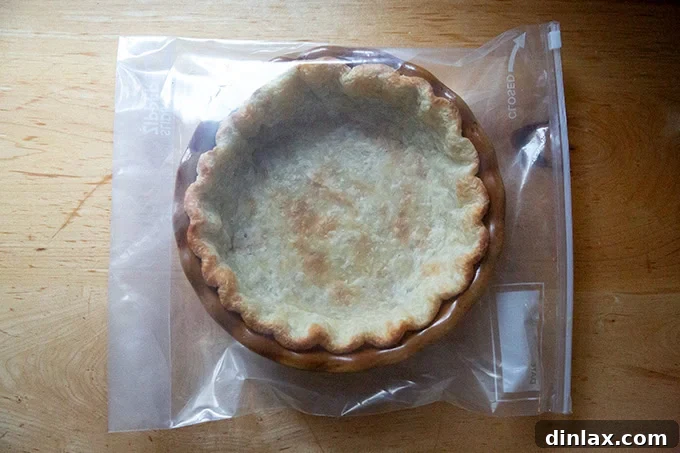 A parbaked pie crust in a ziptop bag.