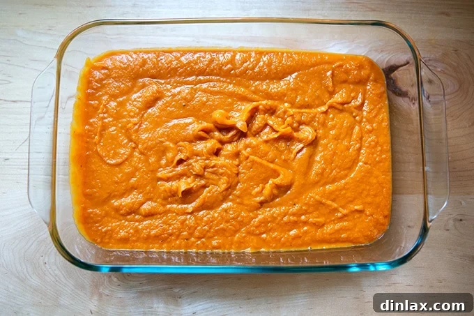 Sweet Potato Comfort Bake 11 A sweet potato purée in a 9x13-inch dish.