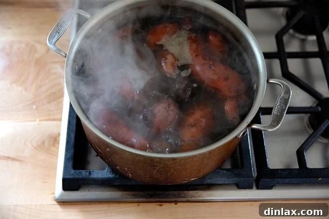Sweet Potato Comfort Bake 5 Boiled sweet potatoes in a pot on the stovetop.