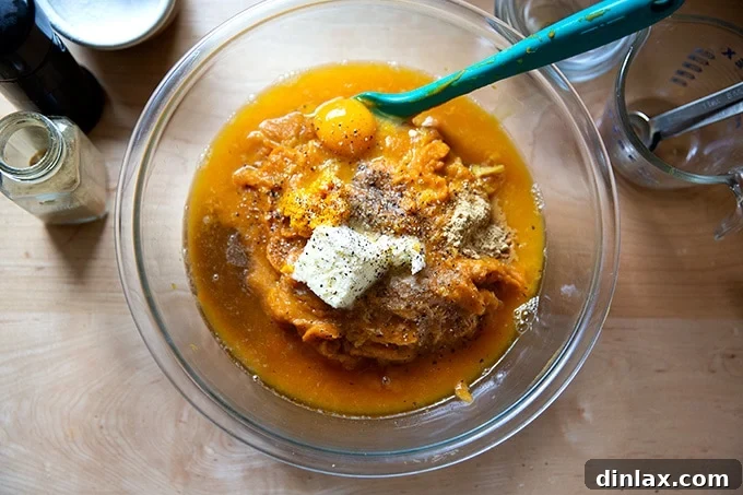 Sweet Potato Comfort Bake 9 The filling for sweet potato casserole in a bowl but unstirred.