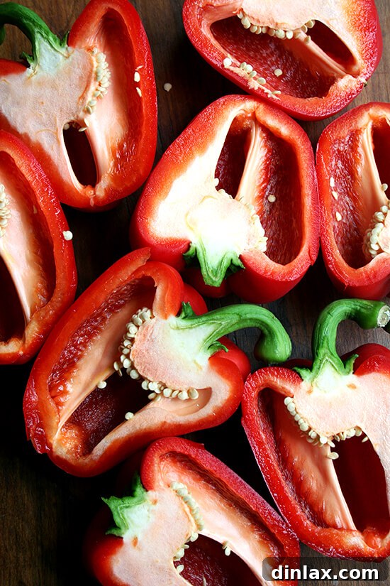 Prepping Red Peppers for Roasting Halved red bell peppers, ready for roasting to bring out their natural sweetness