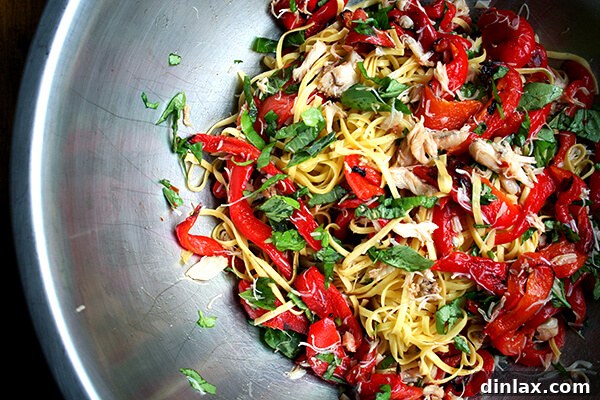 Finished Linguine with Roasted Red Peppers, Crabmeat & Basil All the ingredients for the linguine dish - pasta, basil, crab, and roasted red peppers - beautifully tossed together