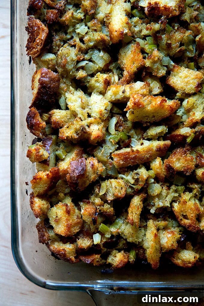 Classic bread stuffing, baked to golden perfection in a 9x13-inch baking dish, ready to be served.