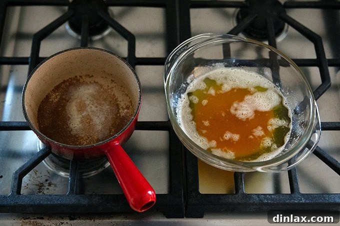 Golden Brown Butter Snickerdoodle Cookies 7 Perfectly browned butter, rich golden-amber in color with toasted milk solids, resting in a heatproof bowl on a stovetop, cooling down.