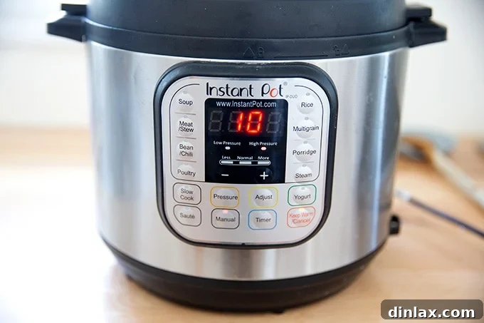 Effortless Butter Chicken and Chickpeas Instant Pot or Stovetop 9 The Instant Pot display showing a set cooking time of 10 minutes at high pressure.