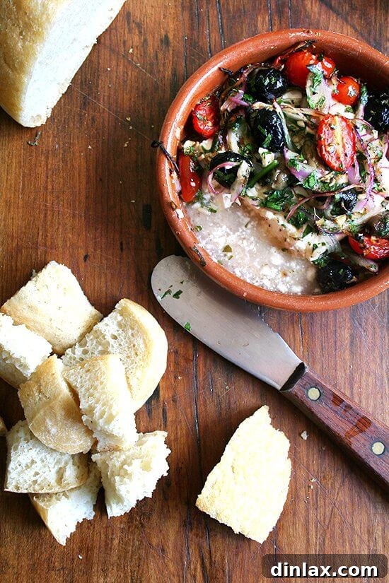 Close-up of baked feta with melted cheese and herbs