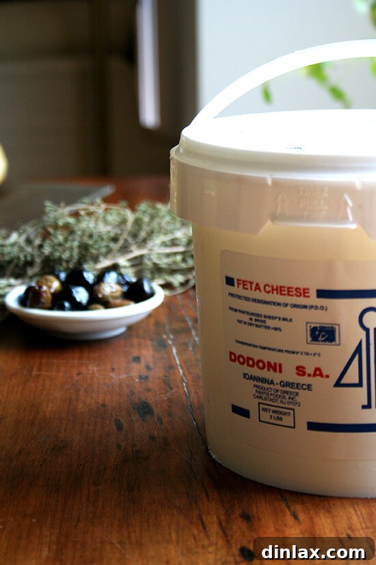 A bucket of fresh, creamy feta cheese