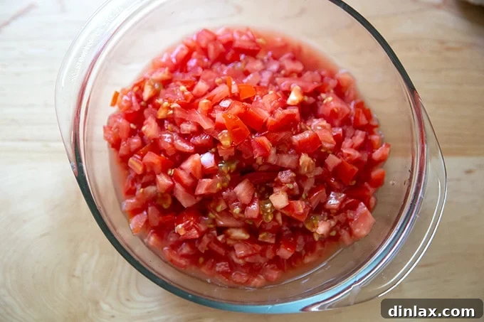 Homemade Trader Joe's Style Bruschetta Sauce 6 A bowl of chopped tomatoes.