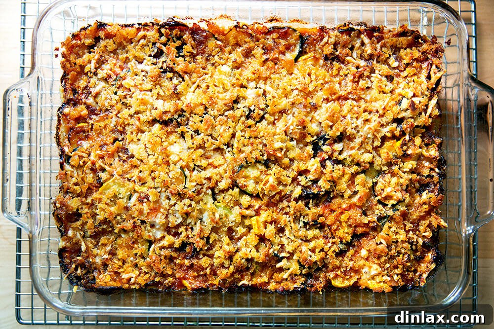 Zucchini Mastery: Margaret Roach's 20 Go-To Recipes 4 A freshly baked dish of zucchini parmesan, golden and bubbling, straight from the oven.