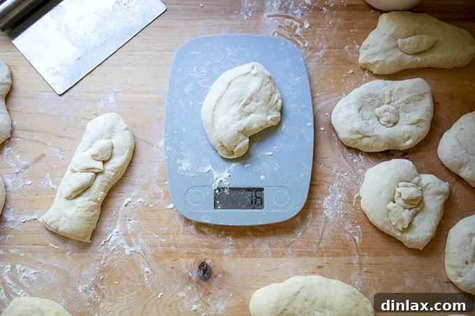 Pillowy Soft Pretzels Made Simple 14 A portion of soft pretzel dough on a digital scale, showing its weight.