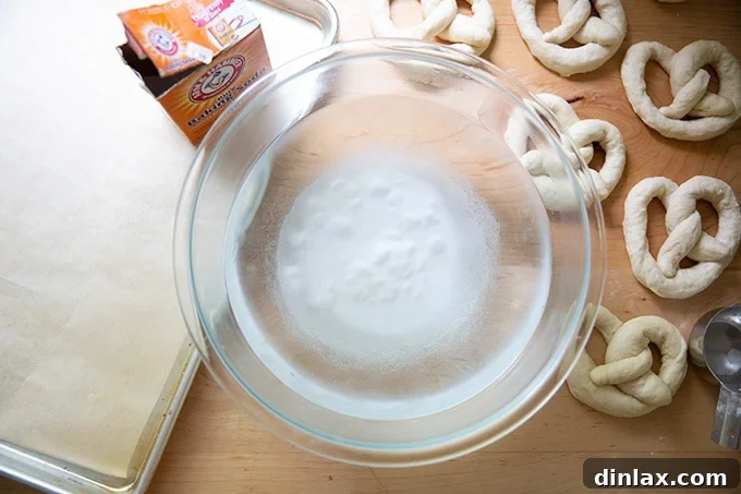 Pillowy Soft Pretzels Made Simple 21 A bowl of hot water with 1/2 cup baking soda dissolved, ready for pretzel dipping.