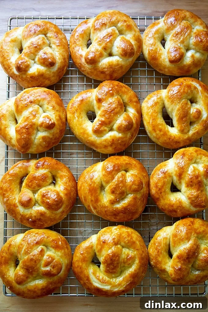 Pillowy Soft Pretzels Made Simple 27 Just-baked soft pretzels on a cooling rack, perfectly golden and buttered.