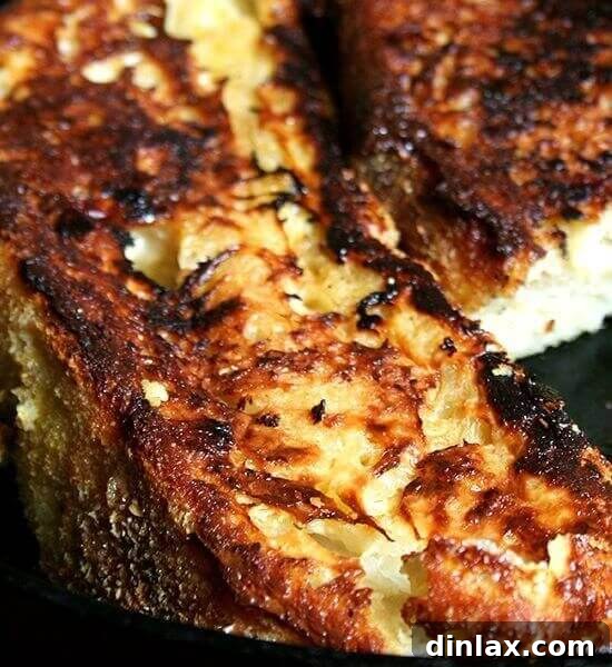 A delicious slice of Baked French Toast, ready to be served for a delightful breakfast or brunch.