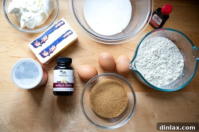 All the essential ingredients neatly laid out on a counter, ready to be combined for the perfect pound cake.