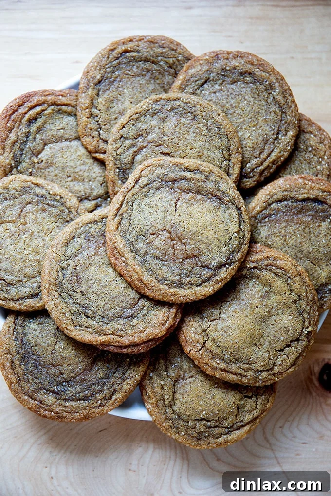A festive plate piled high with golden-brown gingersnap cookies, ready to be served.