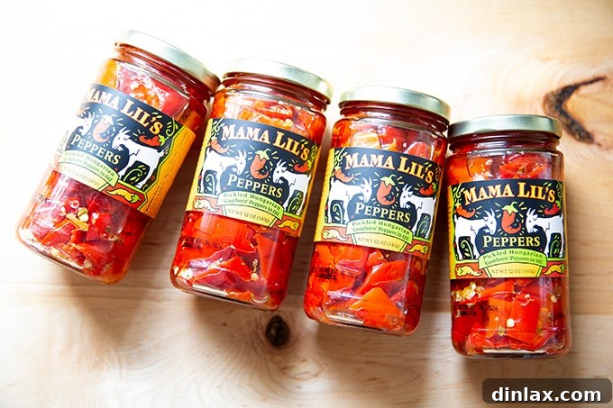 15 Perfect Mothers Day Gifts 3 A jar of Mama Lil's Peppers, vibrant red and ready to be enjoyed.