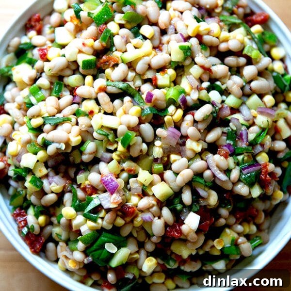 A bean salad in a serving bowl.