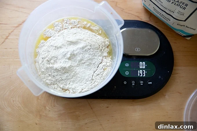 Cultivating Your Own Sourdough Starter 5 A 2-quart container holding pineapple juice and flour before mixing.