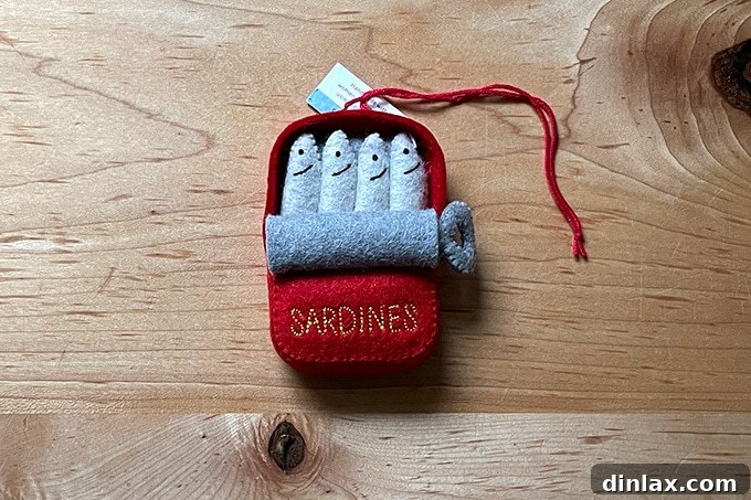 An adorable felt sardine ornament