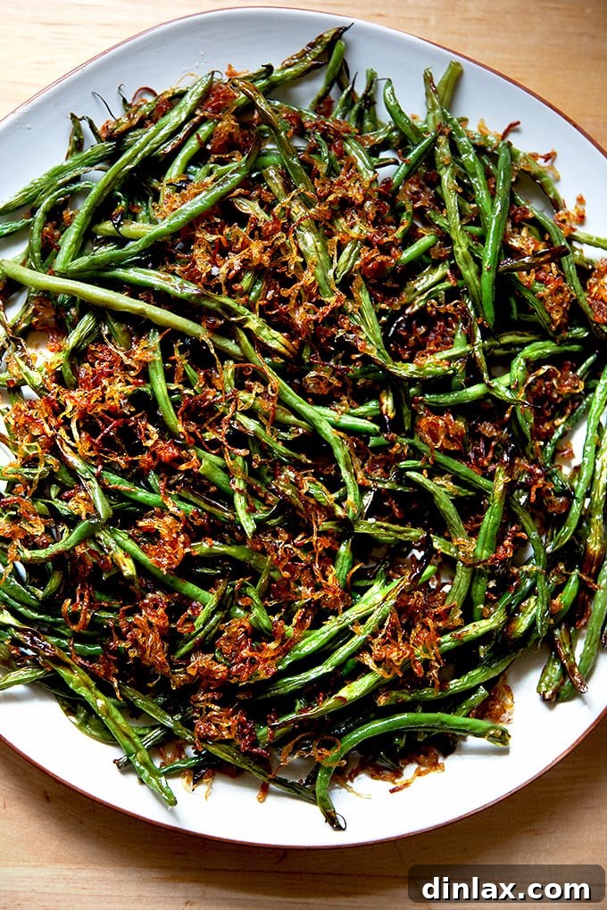 Golden Roasted Green Beans with Sweet Shallot Glaze 2 A platter of roasted green beans with crispy fried shallots.