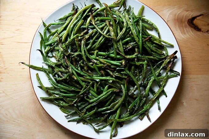 Golden Roasted Green Beans with Sweet Shallot Glaze 18 A platter of roasted green beans.