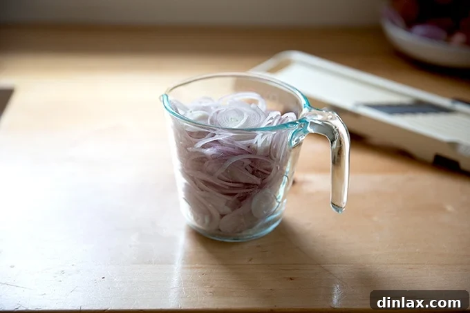 Golden Roasted Green Beans with Sweet Shallot Glaze 6 Sliced shallots in a 2-cup measure.