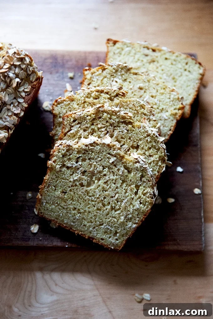 Slices of delicious Irish brown bread arranged on a wooden cutting board.