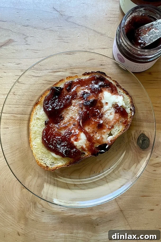 Perfect Gifts for Mom 12 Toast spread with jam, accompanied by an Opinel spreading knife.