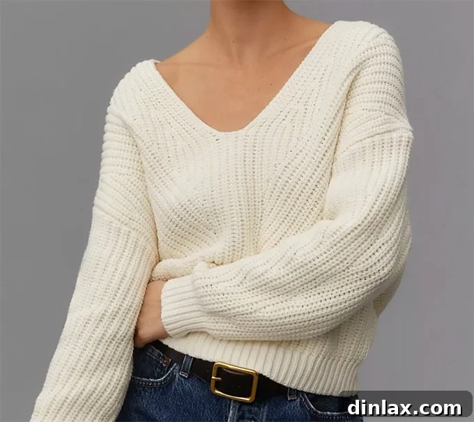 Perfect Gifts for Mom 31 A woman wearing a Maeve V-neck sculptured pullover sweater.