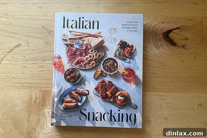Perfect Gifts for Mom 9 Cover of 'Italian Snacking' by Anna Frances Gass, featuring a variety of small Italian treats.