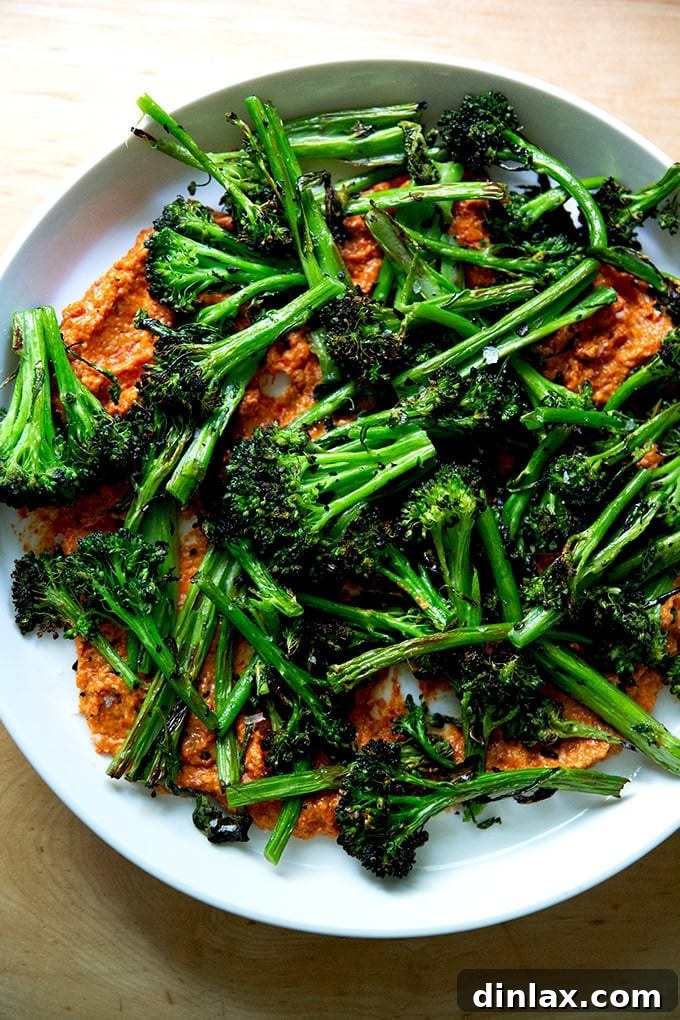 Zahmetsiz Romesco Sosu: Biberleri Soymaya Son! 15 A platter spread with romesco and topped with charred broccolini.