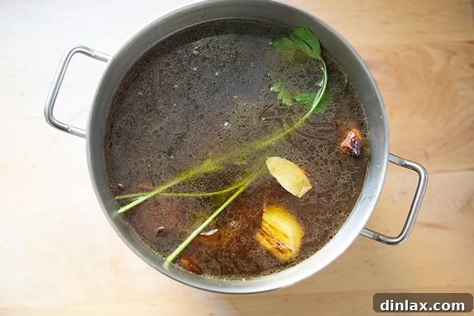 Make Ahead Roasted Turkey Wing Stock 14 A large pot filled with all the turkey stock ingredients, covered with water and ready to begin its slow, flavorful simmer on the stovetop.