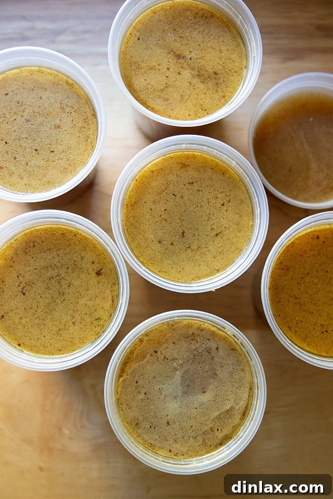 Make Ahead Roasted Turkey Wing Stock 22 Six and a half quarts of freshly made turkey stock, neatly portioned and poised for freezing, ensuring a ready supply for future meals.