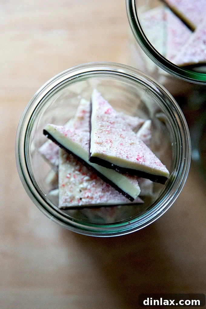 Simple 4-Ingredient Peppermint Bark 2 Overhead shot of peppermint bark in glass jars.