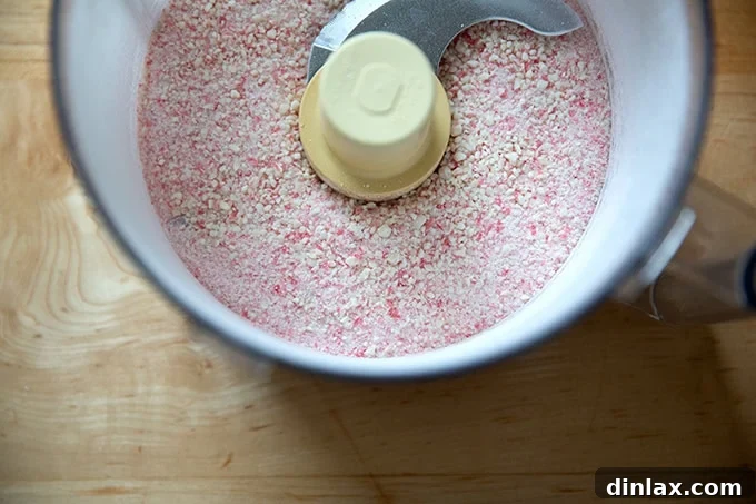 Simple 4-Ingredient Peppermint Bark 5 A food processor filled with crushed candy canes.